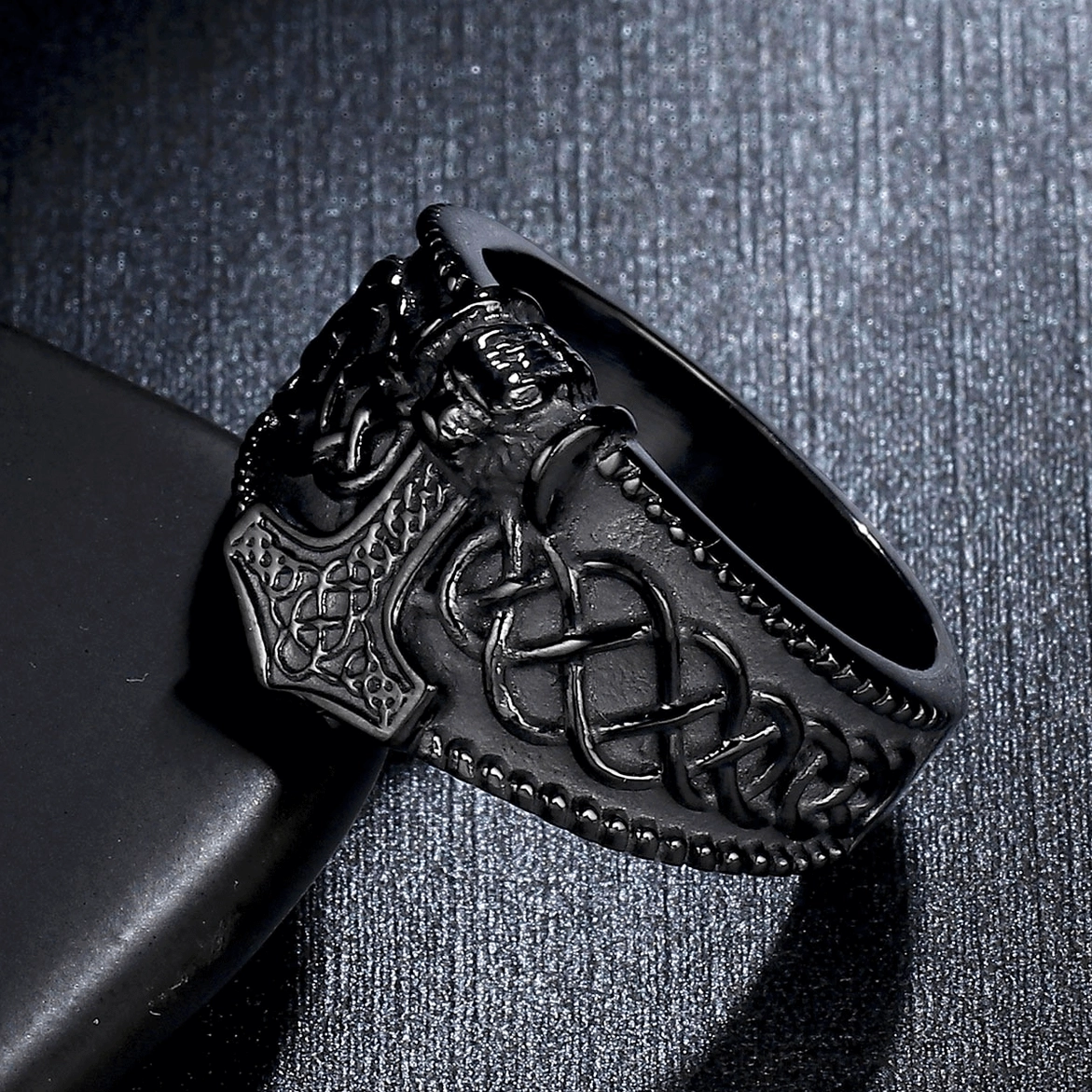 All-black matte stainless steel Mjolnir Celtic gothic ring showcasing engraved Thor's hammer and Celtic knot symbolism