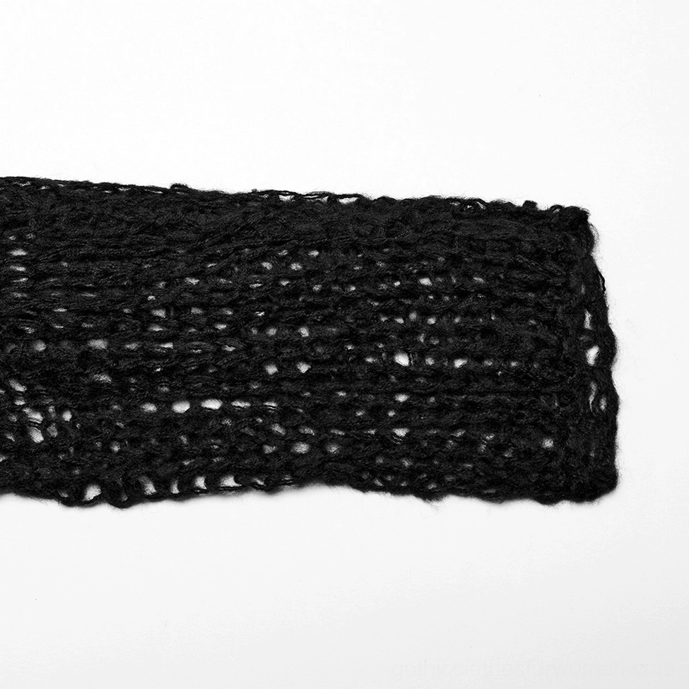 Black knitted fabric swatch showing fuzzy open crocheted mesh texture and material composition detail of distressed gothic sweater