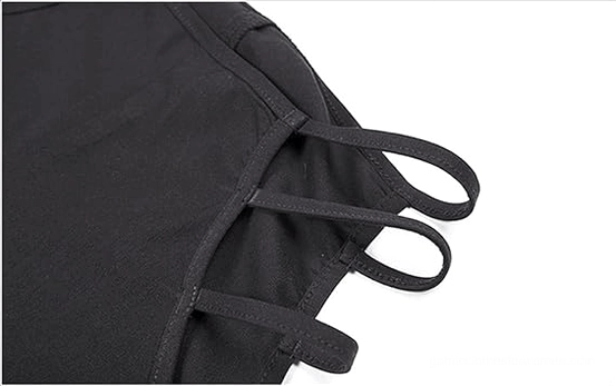 Close-up detail of black gothic pants waist showing layered hollow-out strap design