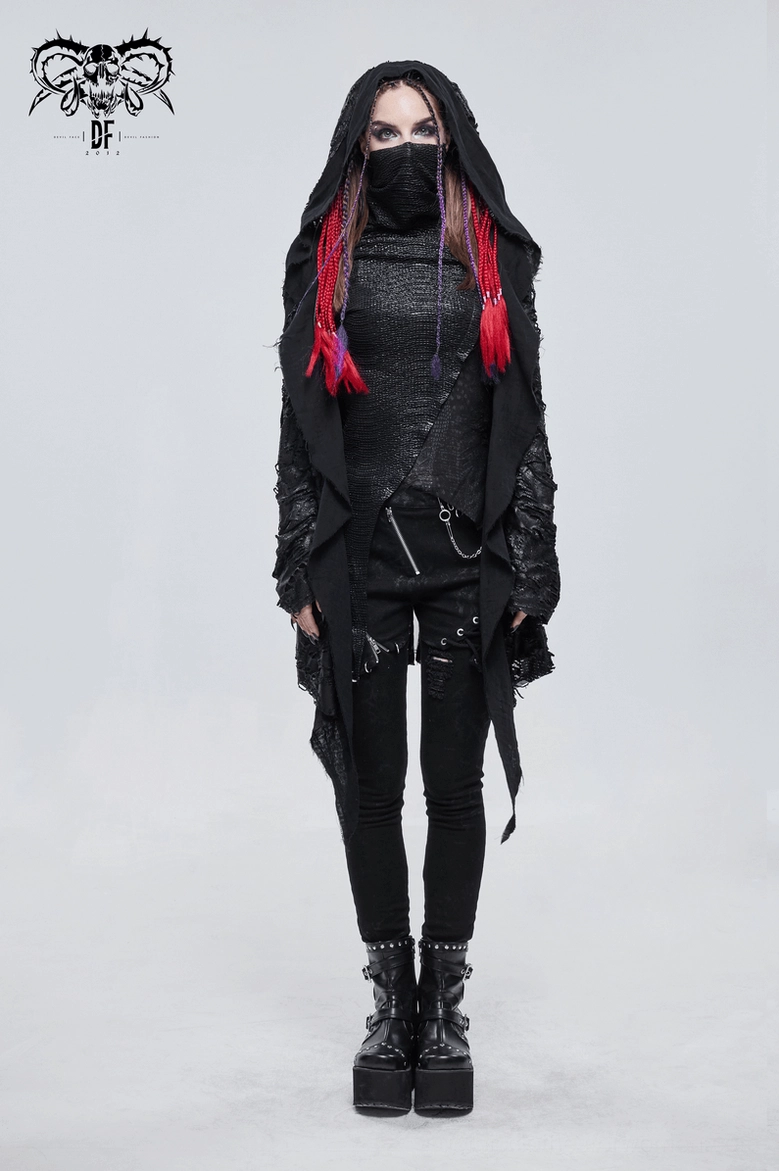 Model wearing black gothic pentagram cape from front angle showcasing asymmetrical silhouette