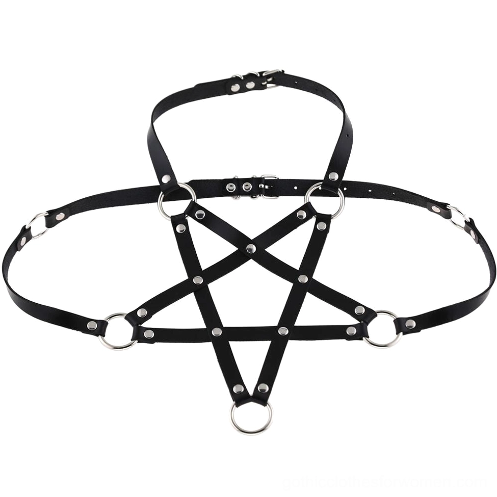 Black pentagram leather chest harness flat lay displaying geometric design with silver metal rings and rivet details