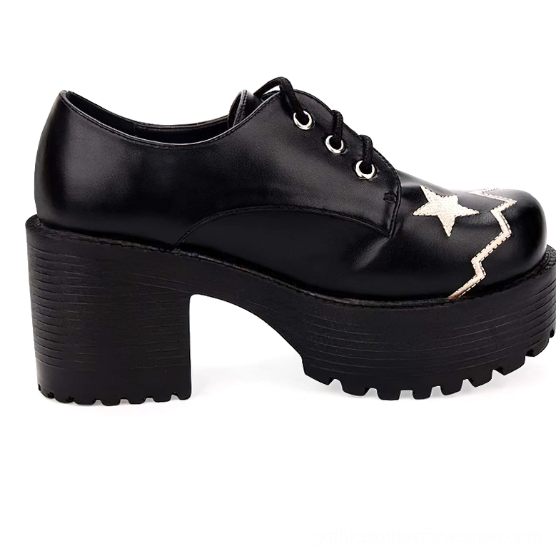 Black platform oxford shoe rear three-quarter view showing star embroidery on toe cap and chunky platform heel
