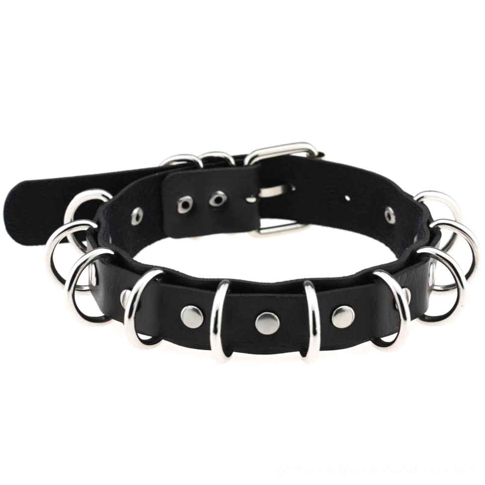Black faux leather gothic choker with silver metal rings and studs, adjustable buckle closure