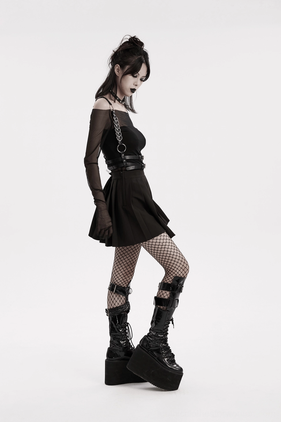 Black PU leather harness on model - alternative fashion body harness with silver metal accents