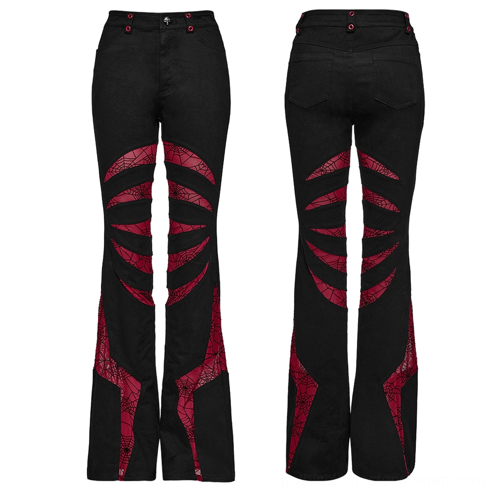 Flat lay front of black gothic flared pants with red mesh cutout inserts high waisted