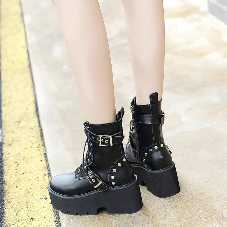 Black gothic rivet combat boots with metal buckles and adjustable straps, alternative fashion styling