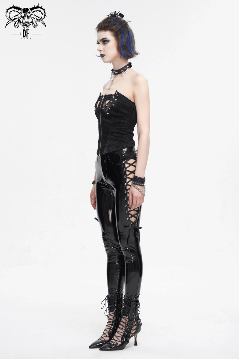 Full-length studio shot of black rivet corset top on model from front