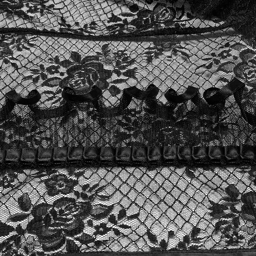 Close-up of black rose floral lace fabric and grid mesh base with ribbon ruffle trim texture