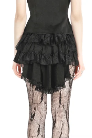 Black gothic mini skirt with cascading ruffles - rear view on model wearing fishnet tights and lace accents