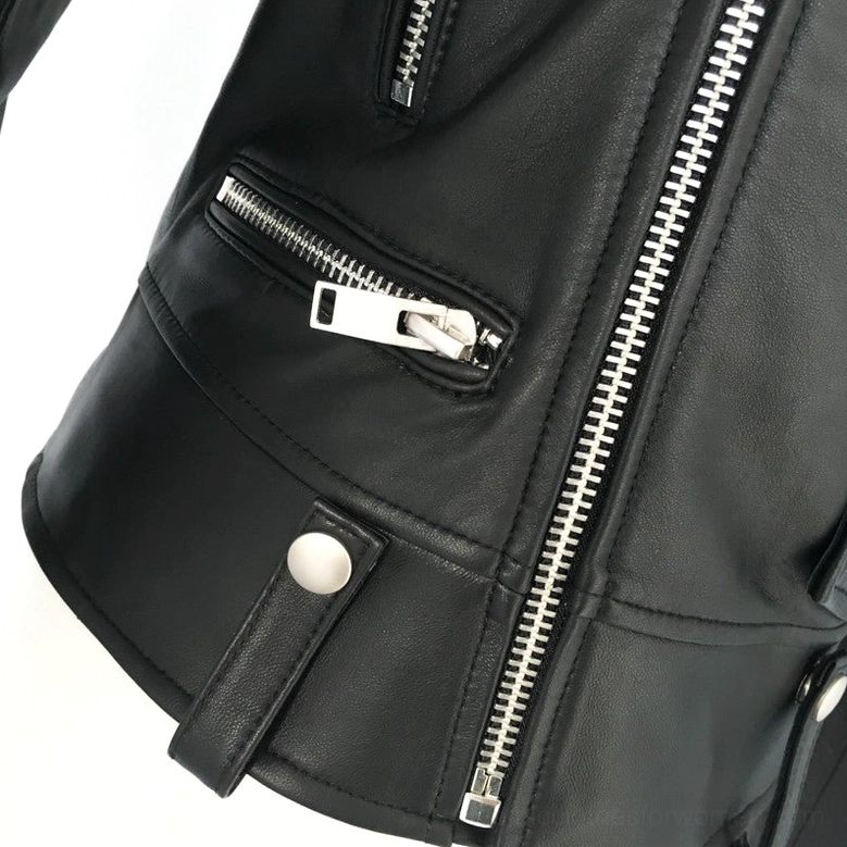 Black sheepskin leather women's motorcycle jacket detail showing pocket construction, material quality, and metal rivet placements