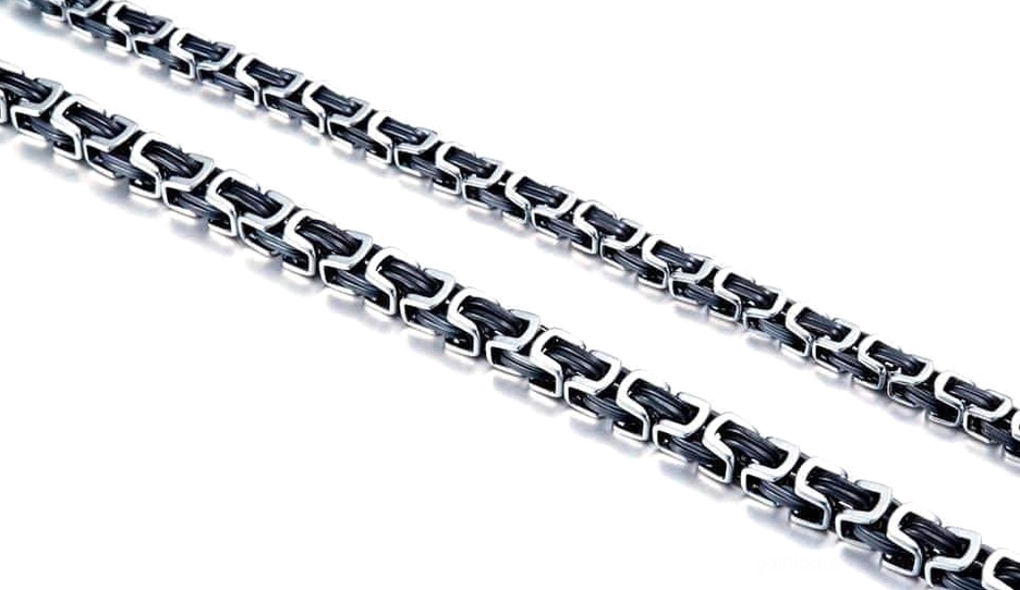 Black and silver twisted chain necklace flat view - gothic statement jewelry with geometric pattern