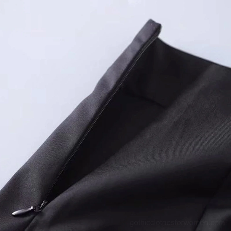 Close-up of black mini skirt waist hardware showing concealed back zipper and smooth tailored polyester-cotton blend fabric