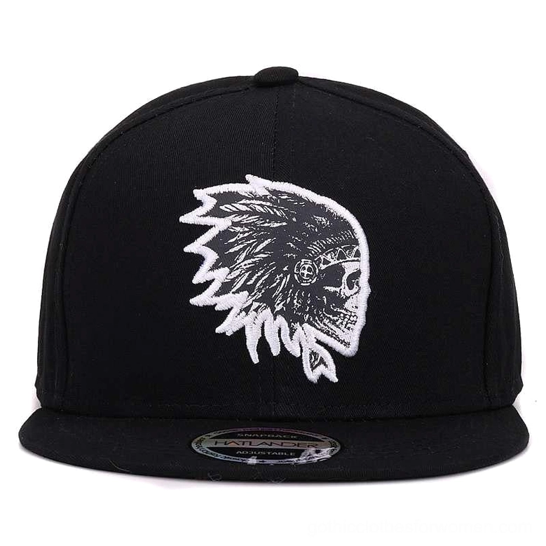 Black gothic snapback cap with white skull embroidery front-facing detail shot