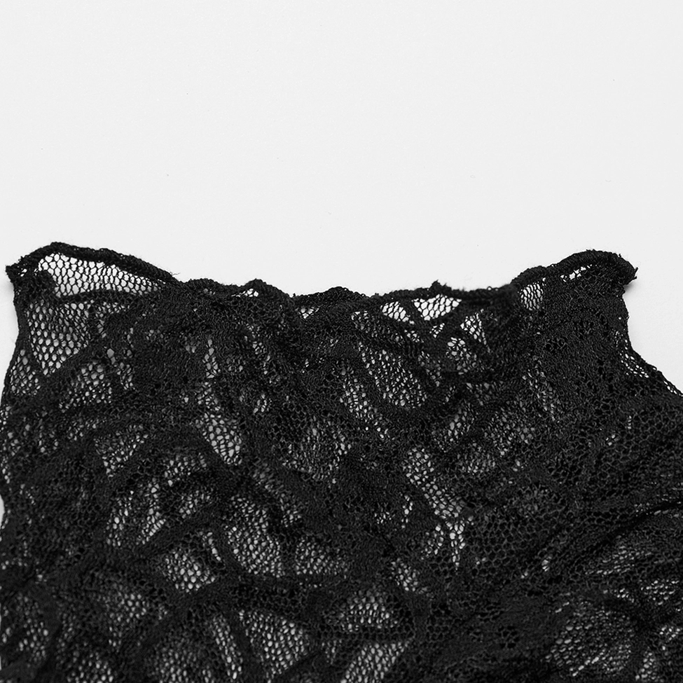 Close-up macro shot of black skull mesh lace edge with scalloped trim and sheer black polyamide fabric texture