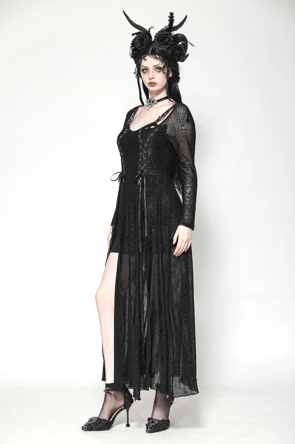Black spiderweb lace-up gothic dress additional styling view on model demonstrating versatile wear
