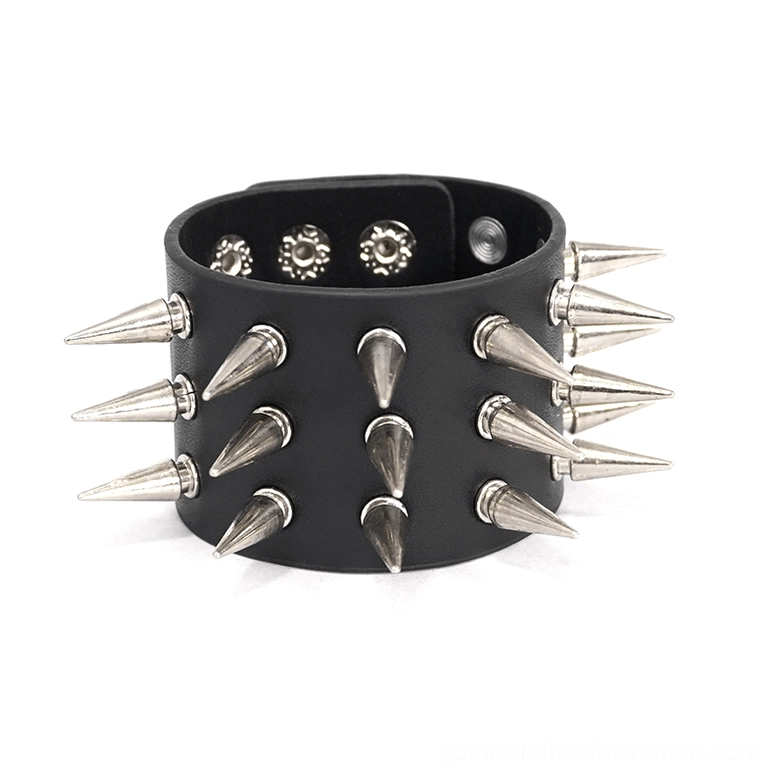 Black leather spike bracelet product shot from above, showing multi-row silver cone spikes and metal snap button construction