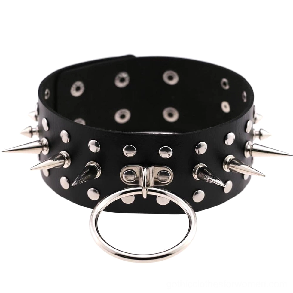 Black gothic spike choker with metal studs and central O-ring pendant flat lay front view on white background