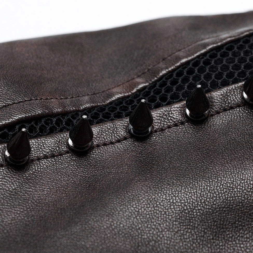 Black cone spike stud trim detail on brown faux leather with mesh underlayer