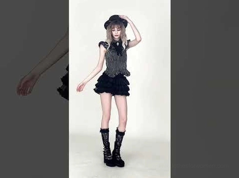 Complete gothic outfit featuring black striped ruffle blouse styled with layered tulle skirt, dark hat and boots