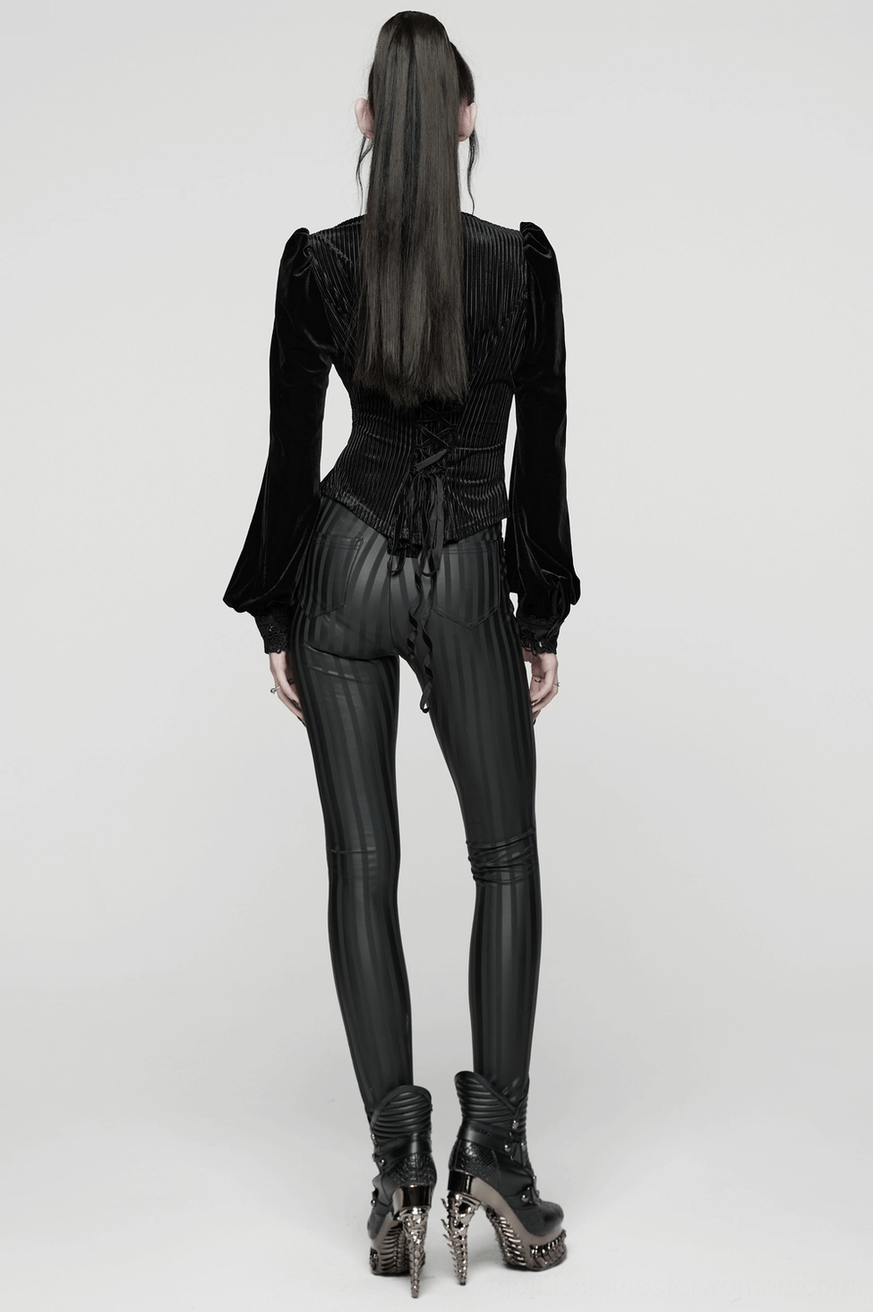 Black striped gothic leggings worn styling, featuring paired with dark outfits and boots for complete goth aesthetic look