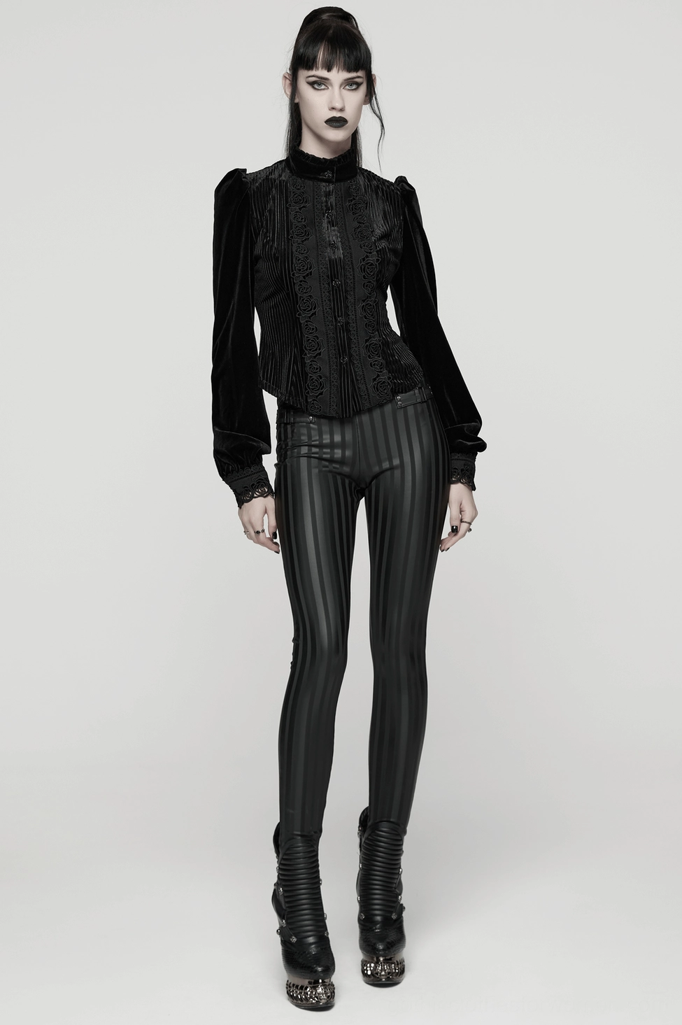 Black striped gothic leggings detail focus on stripe pattern consistency, rubberized finish, and premium material construction