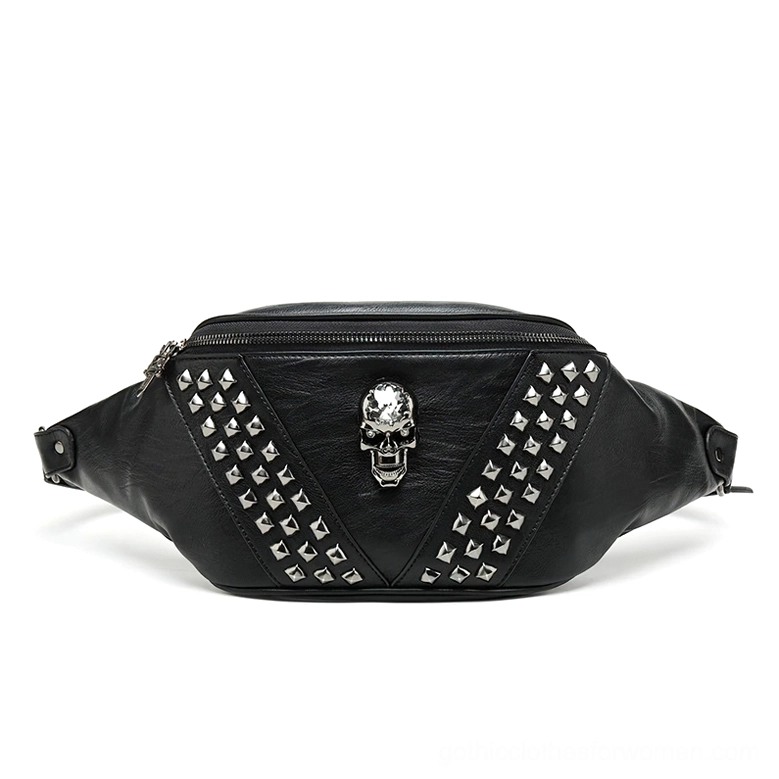 Black gothic studded waist bag with pyramid rivets and central skull ornament, flat lay front view