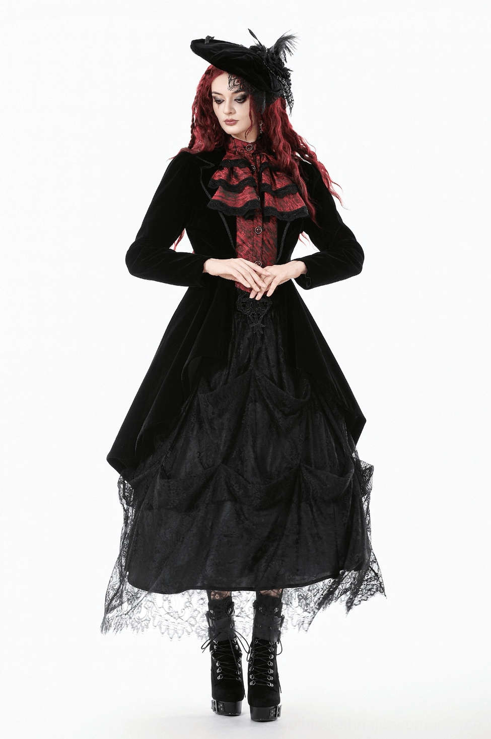 Black velvet tailcoat full silhouette view emphasizing slim fit profile and high-low hemline design