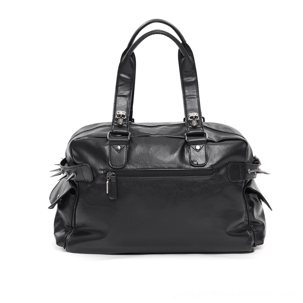 Structured black gothic tote bag front view showcasing spiked side pockets, front zipper pocket, and hardware detailing