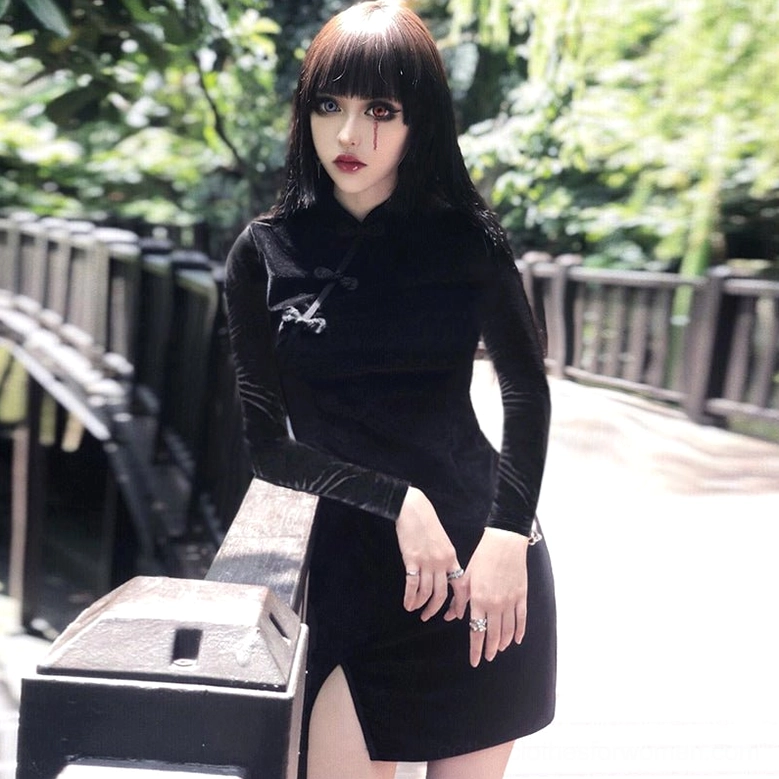 Black velvet cheongsam dress detail shot of mandarin collar and neckline design