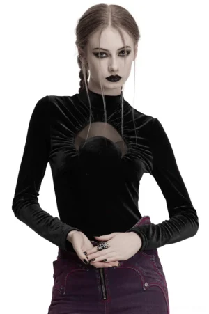 Black velvet gothic top with stand collar and crescent cutout detail, front view on model with contrast stitching