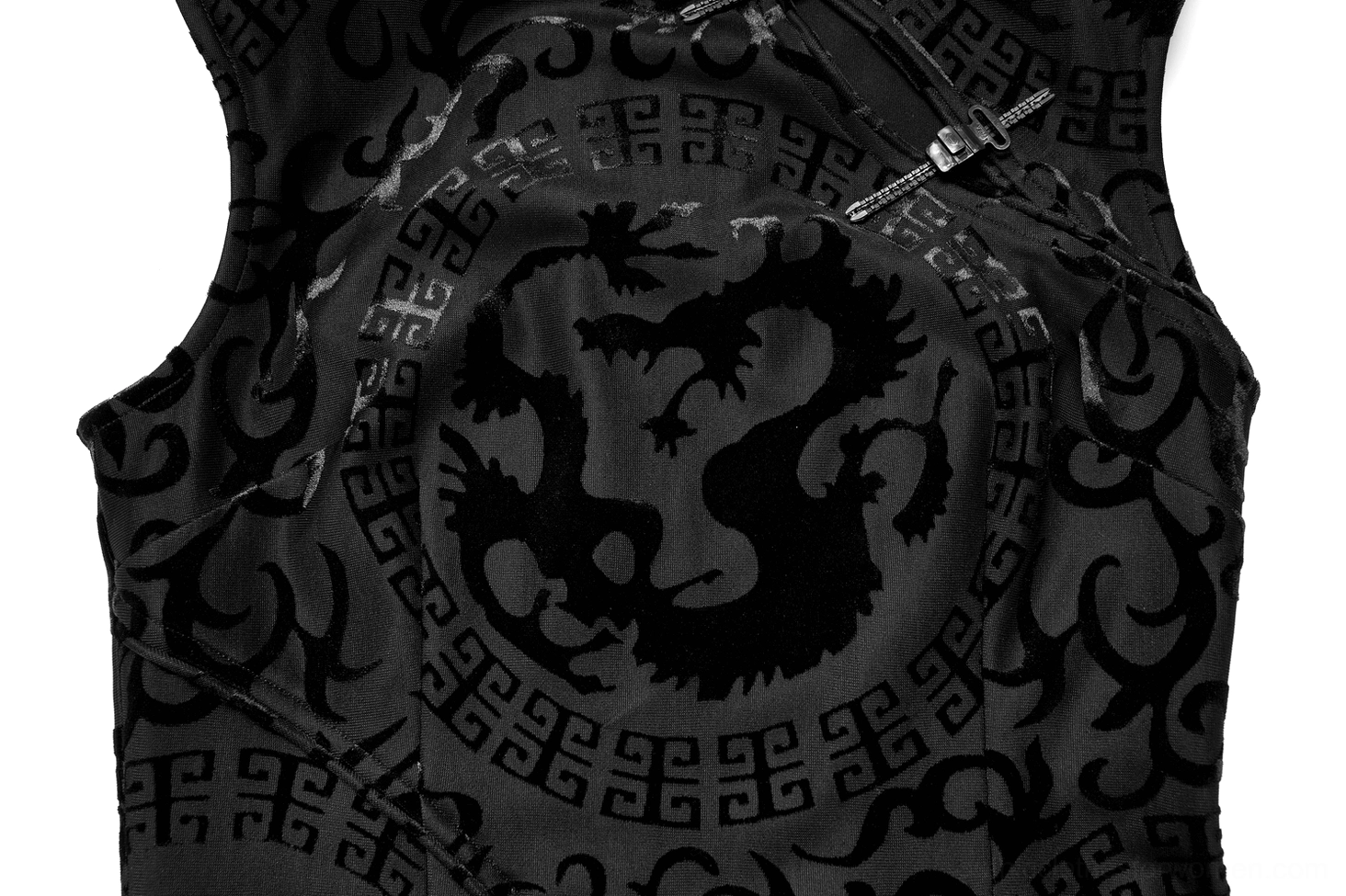 Black velvet burnout fabric close-up intricate dragon jacquard pattern detail