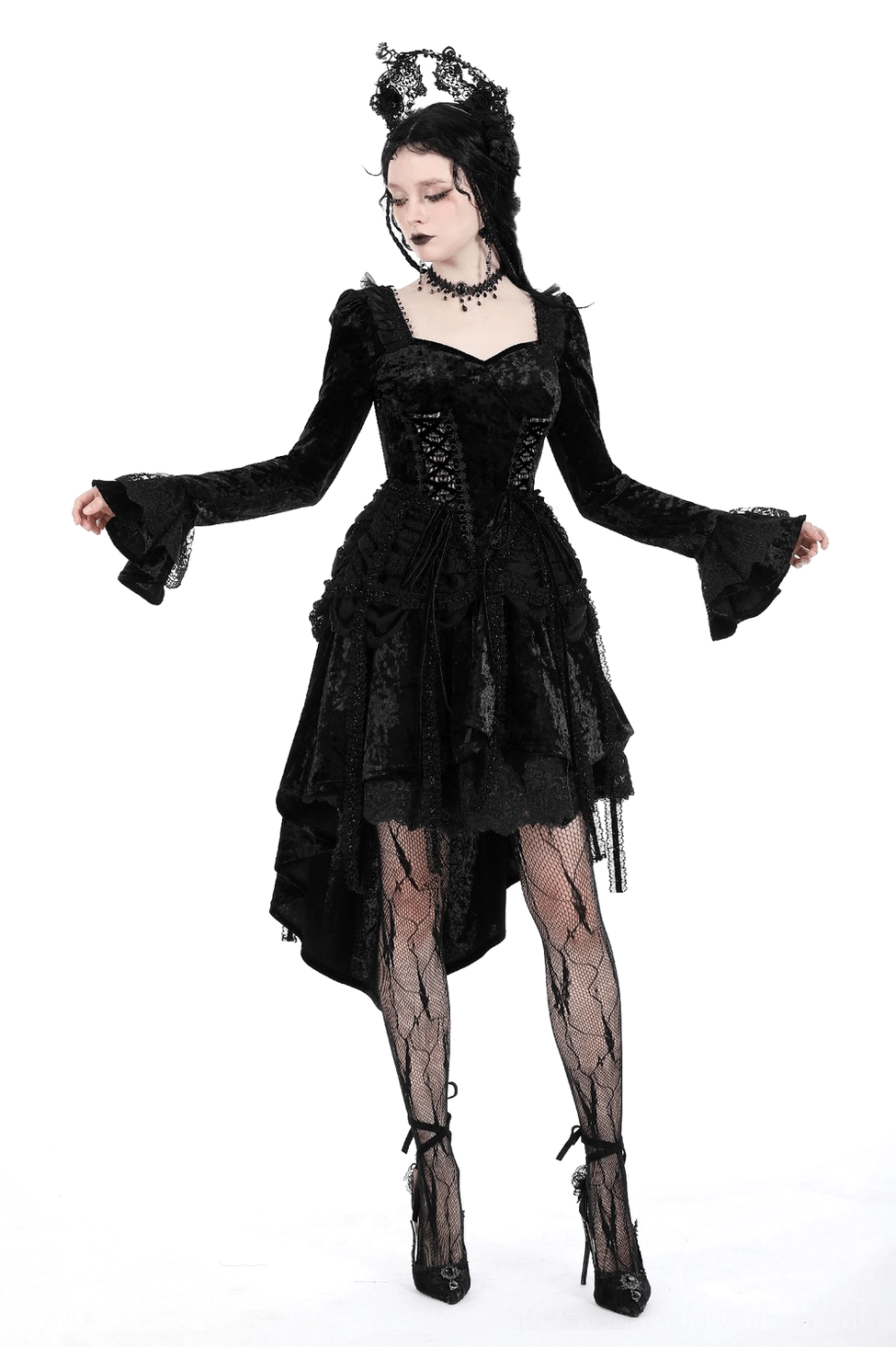 Black velvet gothic dress complete styling with accessories showing dovetail skirt and lace details