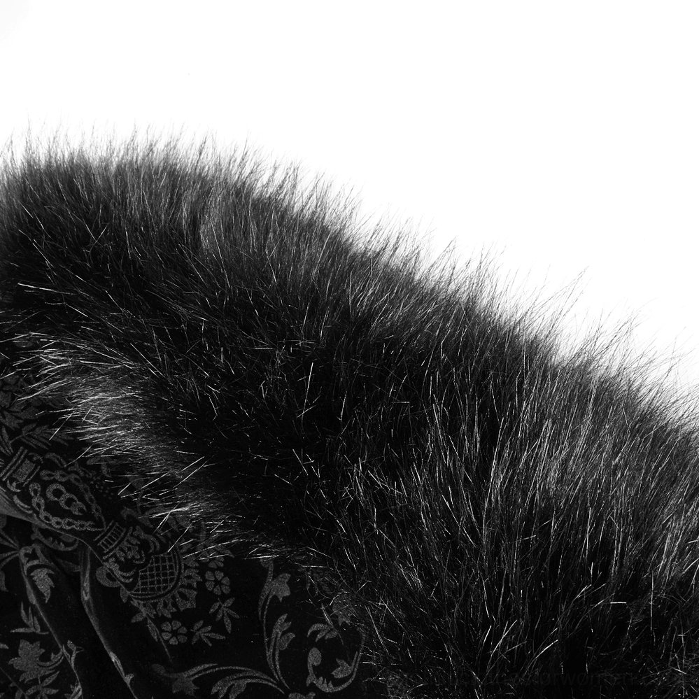 Close-up macro view of black velvet fabric texture and faux fur trim on Gothic cloak showing quality craftsmanship