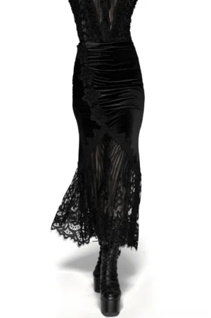 Black velvet fishtail gothic maxi skirt front view with 3D ruched details and lace hem on model