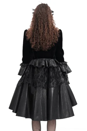 Gothic black velvet bolero jacket back view showing layered lace ruffle hem and faux leather skirt panel detail