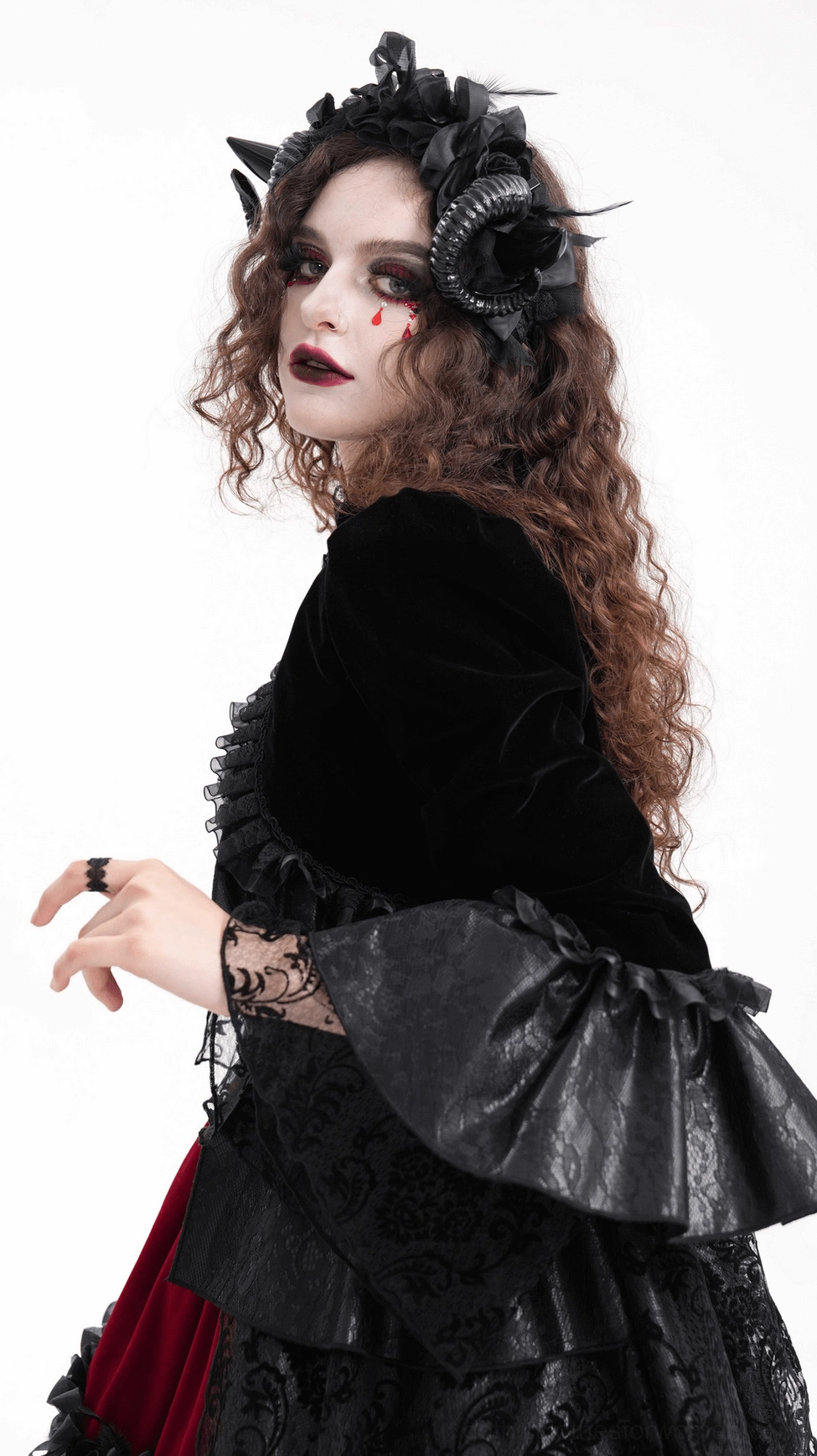 Gothic velvet bolero jacket complete styling with dramatic ruffles and alternative fashion elements