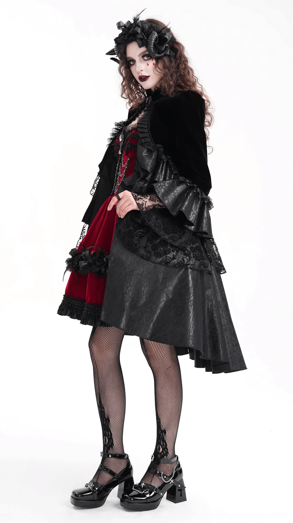 Gothic bolero jacket layering detail showing lace panels, ruffles, and dimensional construction