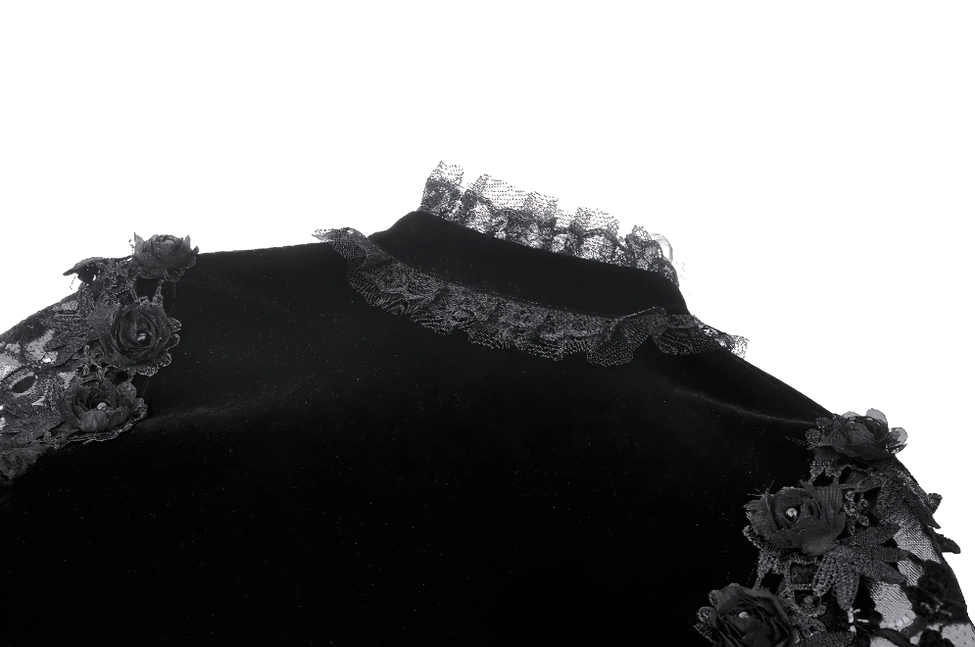 Black velvet gothic bolero product detail shot emphasizing lace trim, puff sleeves, and structured silhouette