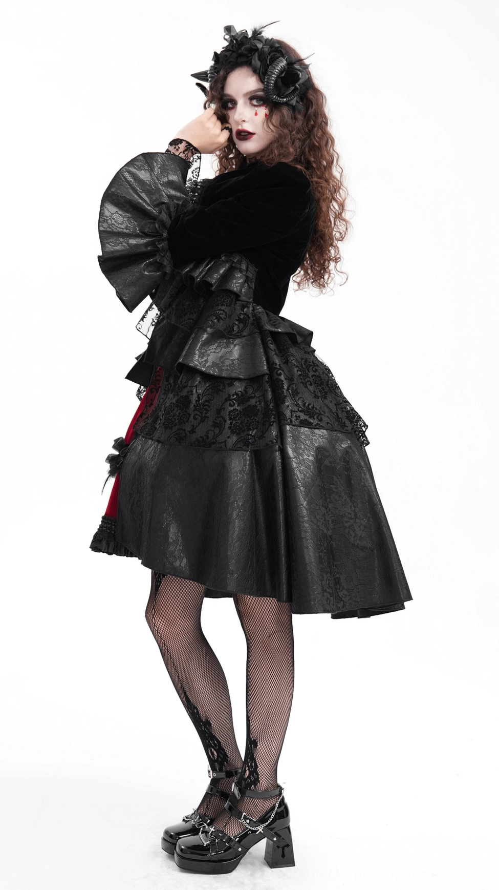 Black velvet gothic bolero jacket side profile emphasizing stand collar and structured silhouette
