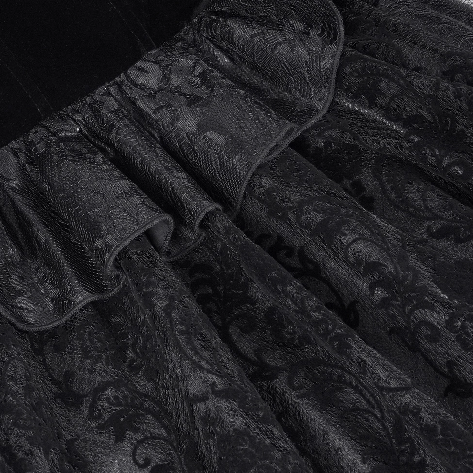 Gothic black velvet bolero with ornate lace ruffles showcasing layered texture and alternative fashion aesthetic