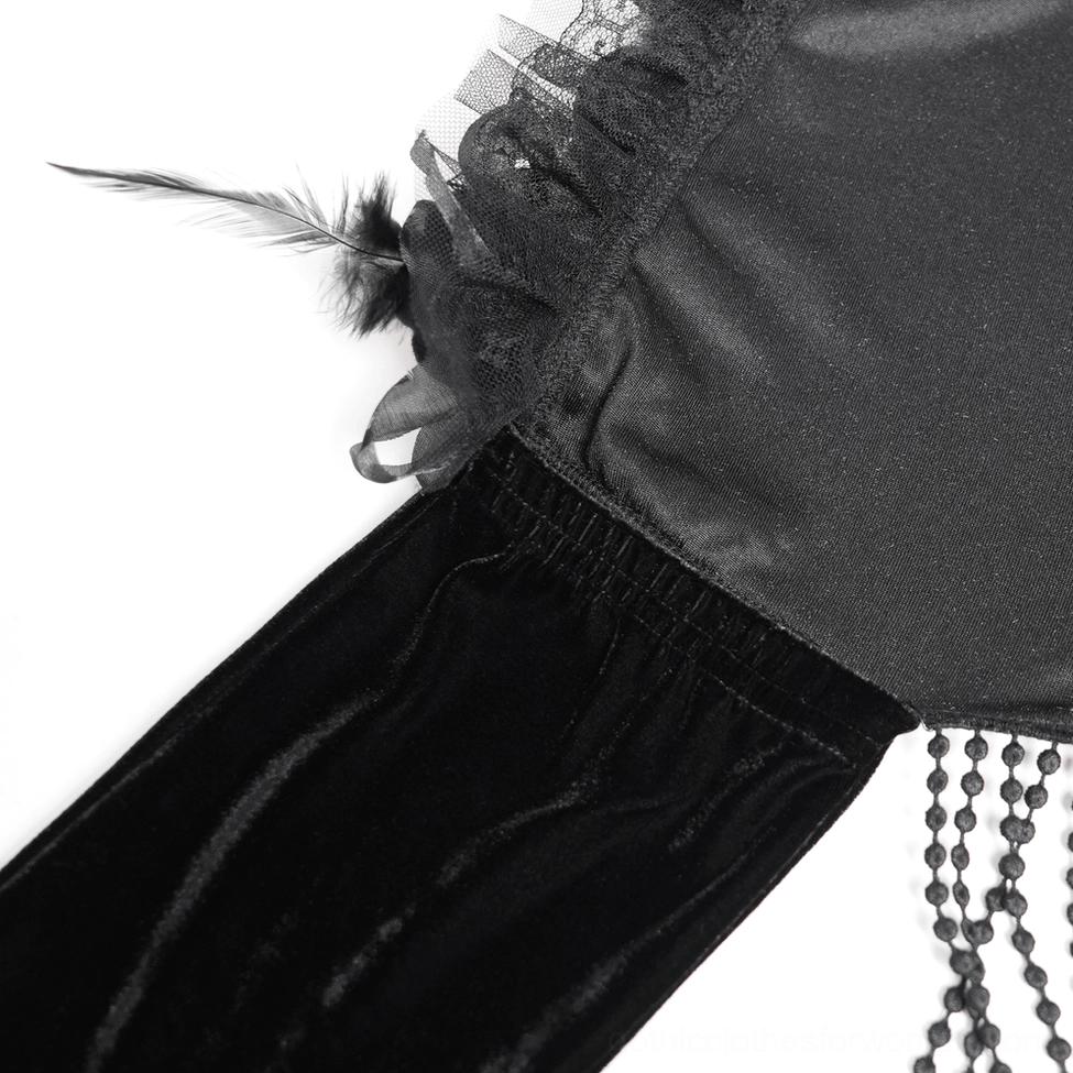 Gothic black velvet hooded cape with rose floral embellishment and beaded fringe, full-length display showing silhouette