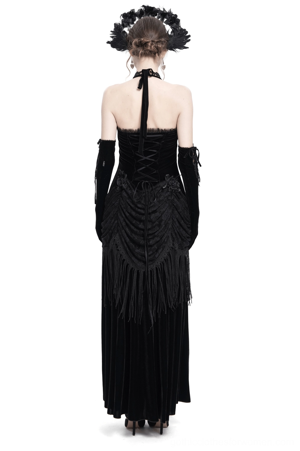 Gothic black velvet dress rear view showing corset lace-up back and fringe trim details