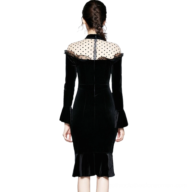 Black velvet gothic dress back view featuring exposed mesh yoke and slim fitted silhouette, rear full-body model shot on white background
