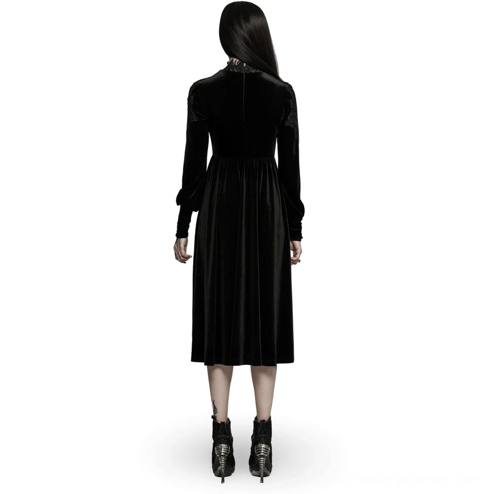 Back view of black velvet gothic midi dress showing hidden rear zipper closure and high gathered waist