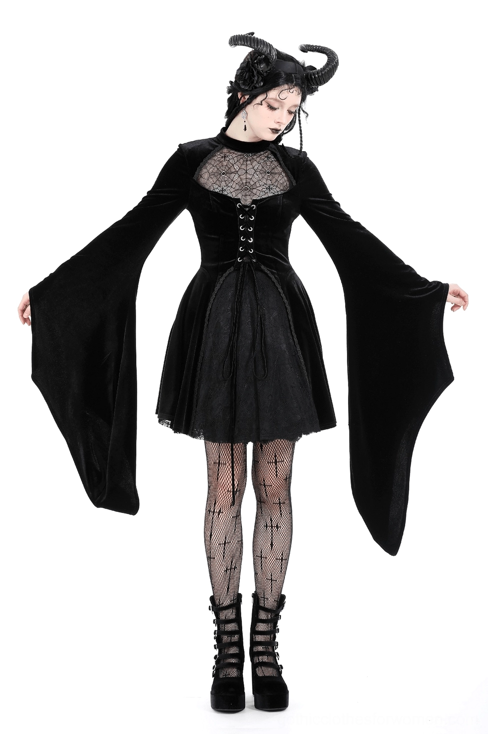 Black velvet gothic dress textile and fabric quality close-up showing velvet luxurious texture and sheen