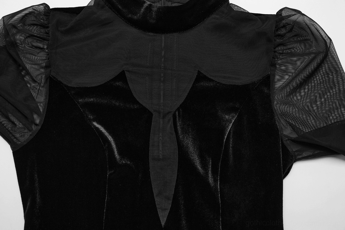 Close-up detail of high stand collar and keyhole cutout neckline on black velvet gothic mesh dress