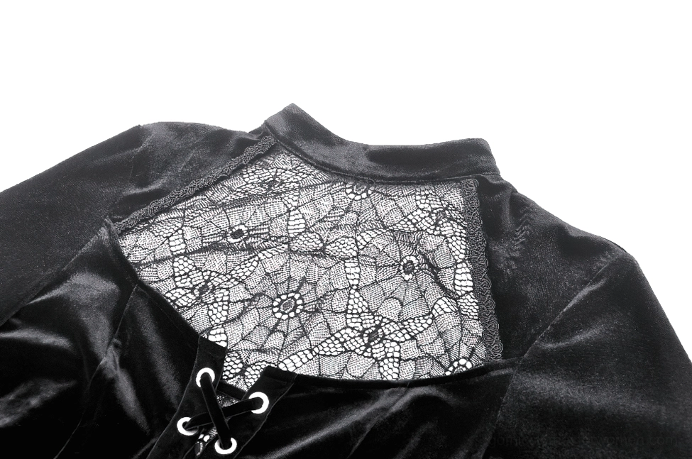 Close-up detail of black velvet gothic dress neckline showing spiderweb lace insert and stand collar