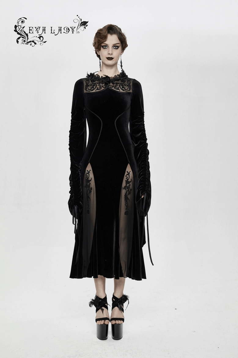 Black velvet gothic dress on model showing overall proportions and sophisticated silhouette
