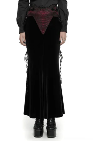 Black velvet gothic fishtail maxi skirt front view on model, featuring burgundy rose buckle and side drawstrings