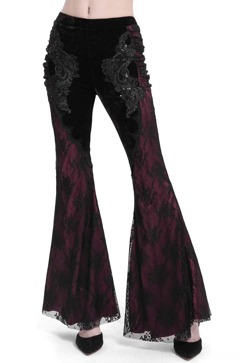 Black velvet and wine-red lace gothic flare pants front three-quarter view, showing embroidered appliqué details and dramatic lace hem